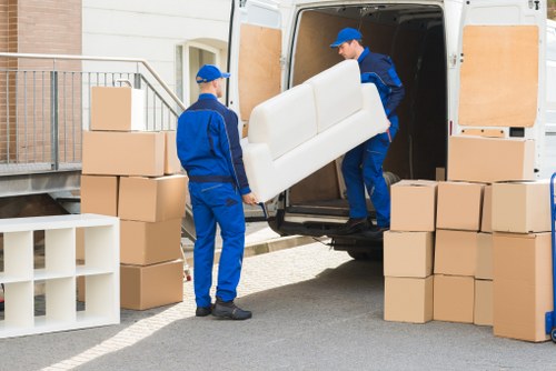 Professional movers handling a flat relocation in Kensington