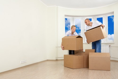 Local moving van crew handling a property relocation in Kensington