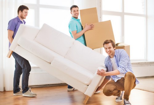 Moving furniture and office items through a Kensington building