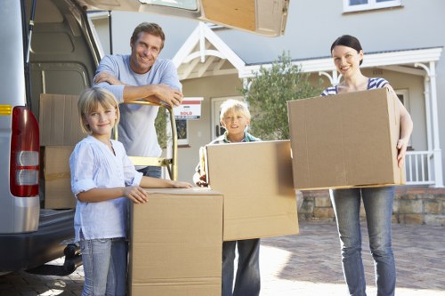 Loading furniture into a van for a Kensington property move