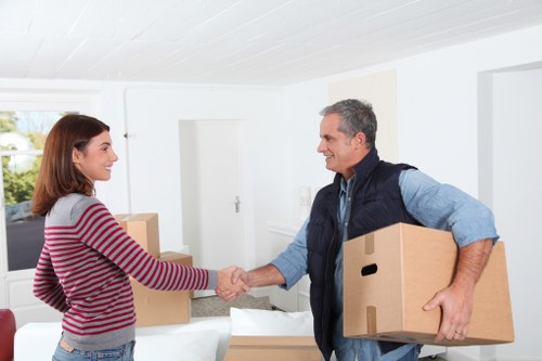 Preparation checklist for moving home in Kensington with boxes and furniture